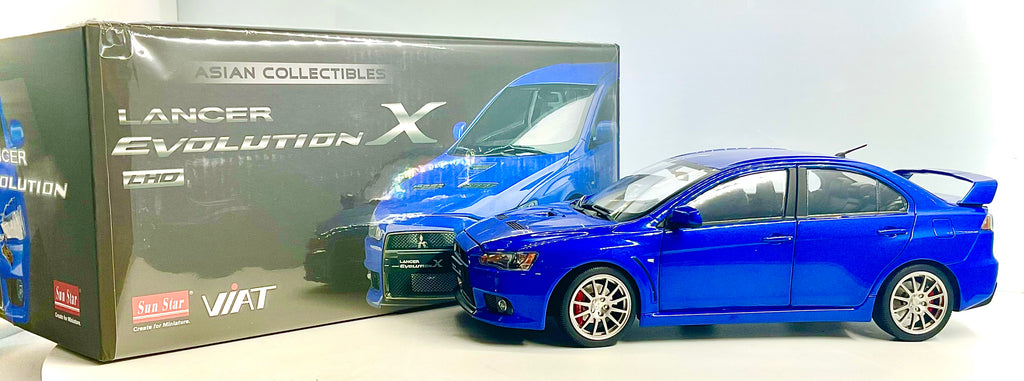 MITSUBISCHI LANCER EVOLUCION X ( LHT ) , SUN STAR scala 1/18