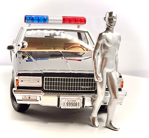 Chevrolet Caprice Metropolitan Police 1987 Terminator 2 scala 1:18 – Greenlight - vista frontale con personaggio