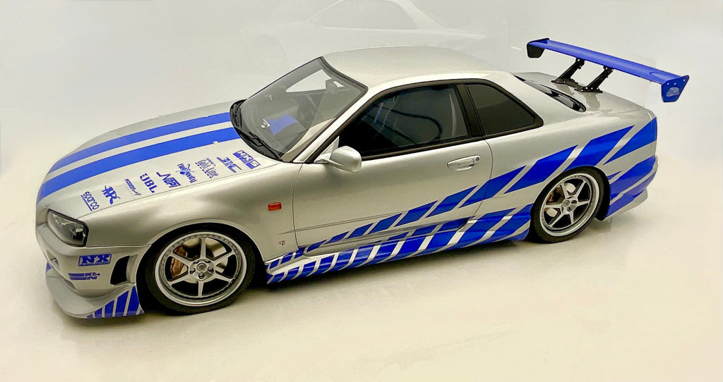Kyosho 1:12 Nissan Skyline R34 GT-R Fast & Furious (Brian O'Conner) - Resina - NUOVO IN SCATOLA - 012007A , vista laterale sinistra 
