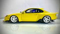 Kyosho Nissan Silvia S15 Khyzyl Saleem gialla, modellino visto di lato.